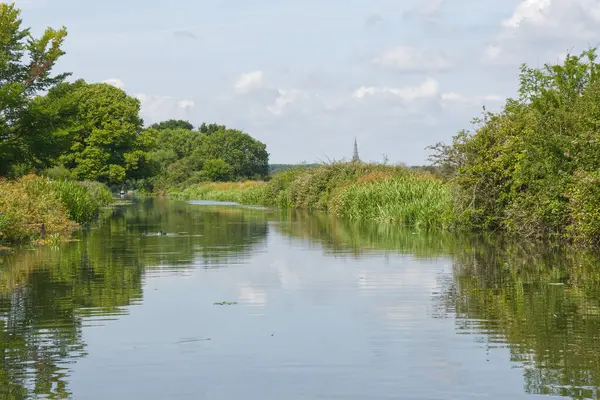 Stock image View to Chichester Cathedral from narrowboat on canal. West Sussex, England. Famous view painted by Turner.