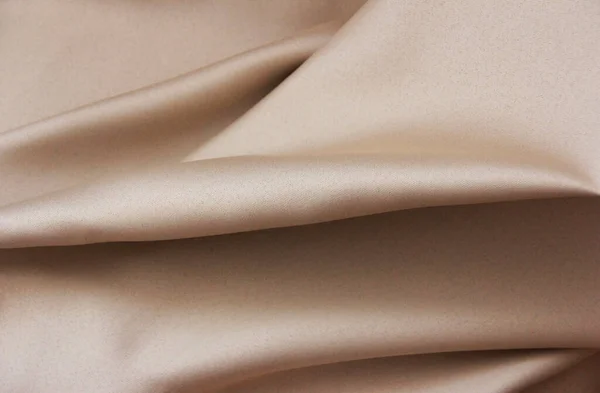 Крупным Планом Текстуры Бежевой Ткани Складками — стоковое фото