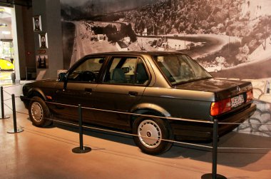 Antalya, Turkey, February 14, 2023. An old rare black car with headlights