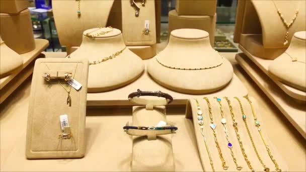 Various Gold Women Jewelry Necklaces Rings Bracelets Shop Window — Stock Video