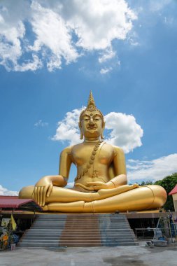 Golden Buddha Statue On Blue Sky. Big Golden Buddha Statue At Saraburi Temple.