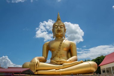 Golden Buddha Statue On Blue Sky. Big Golden Buddha Statue At Saraburi Temple.