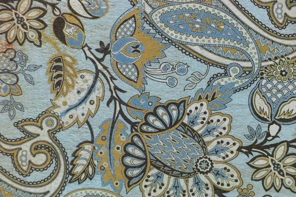Blue, green and ochre cashmere paisley background