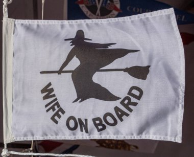 flag (object cut out) representing a woman aboard a boat clipart