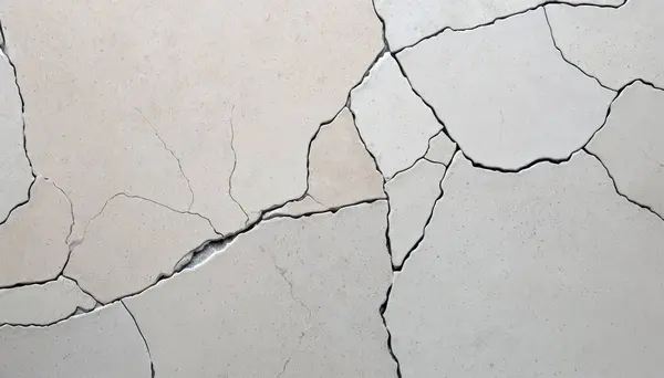 Soyut arkaplan olarak çatlamış beton duvar