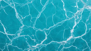  İç döşeme ve duvarların tasarımında kullanılan doğal İtalyan mermeri sergilenen bej mermer dokunun arka planı.