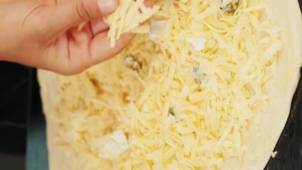 Close Female Hands Scattering Grated Cheese Pizza Vertical Video Process — Stock Video