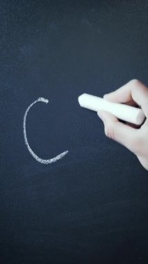 Chalkboard. Word Chalkboard written on blackboard. Vertical video