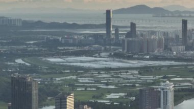 10 Ekim 2019 modern binalar günbatımında Hong Kong, Kowloon 'da