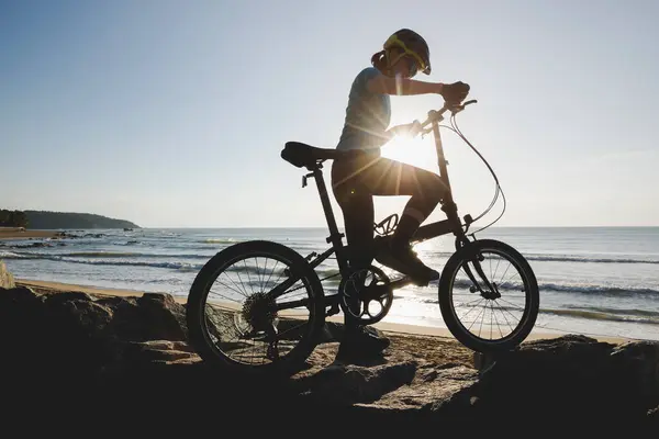 Riding Folding Bike Sunrise Seaside Road — Stock Photo, Image