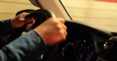 woman driving a car in the night