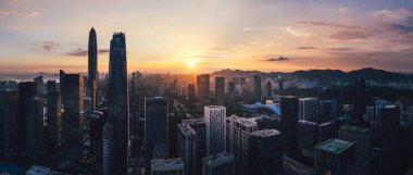 Aerial panorama view of landscape in sunset Shenzhen city,China clipart