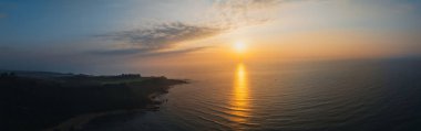 Aerial view of sunrise sea landscape clipart