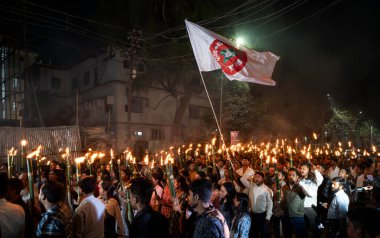 Members of the All Assam Students' Union (AASU) take part in a flaming torch rally and shout slogans to protest against the implementation of the Citizenship Amendment Act (CAA), on March 12, 2024 in Guwahati,  Assam, India. The Citizenship Amendment clipart