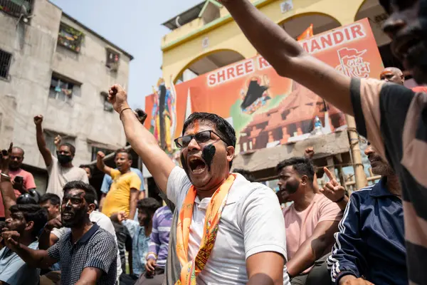 stock image People paint black paint on face as they stage a protest demanding justice after a poster featuring Lord Ram defaced with black paint by unidentified miscreants on April 28, 2024 in Guwahati, Assam. India. A poster of Lord Ram, put up by the Establis