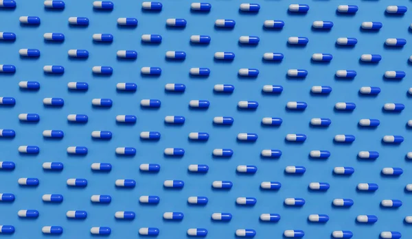 stock image medical pill capsules on a blue background. Healthcare concept. 3D Rendering.