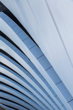 Top view of curvilinear balconies. Building exterior of modern architecture.