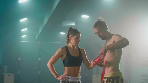 Man Preparing Bandages Woman Muay Thai Boxer Getting Ready Fight — 비디오