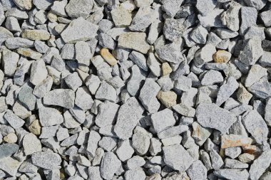 angular broken gravel lies in a plane, but patchy - background clipart