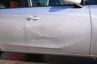 heet metal damage from a car accident - close-up clipart