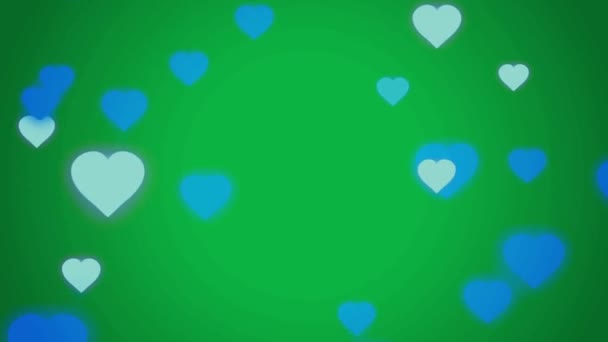 Animatie Blauwe Harten Vorm Zweven Groene Achtergrond — Stockvideo