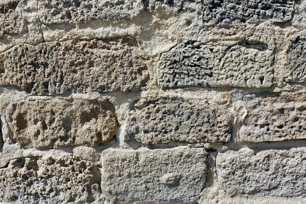 灰色の石壁 シームレスな背景テクスチャ 中世の風化壁を着用 — ストック写真