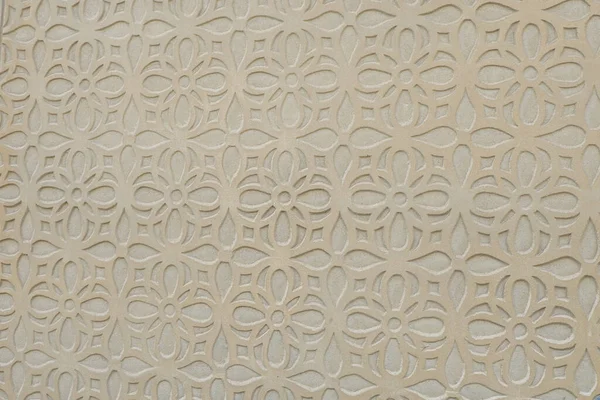 İspanya 'nın tarihi Yahudi semtindeki evlerin duvarında geleneksel bej renkli desenler var. İspanyol dekorasyon tekniği sgraffito veya esgrafiato.