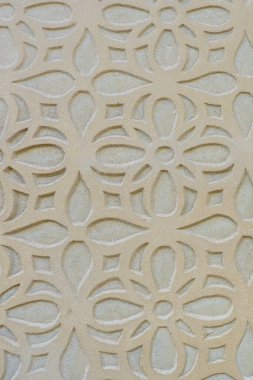 İspanya 'nın Segovia şehrinde duvar desenli sgraffito ya da bej rengi esgrafiato kullanılıyor. Dikey fotoğraf.