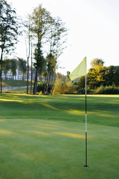 Golf Course Triumph: Finish Line Flag
