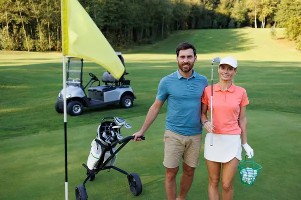 stock image Young Couple Concluding Golf Round