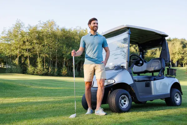 Man Posing with Golf Equipment
