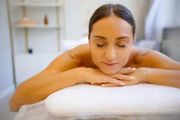 Blissful Moments: Woman on Spa Massage Table