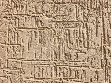 Khaki web sitesindeki beton duvar dekorasyonunun stok fotoğrafı. Tekstil tasarımı veya ev dekorasyonunda kullanılır..