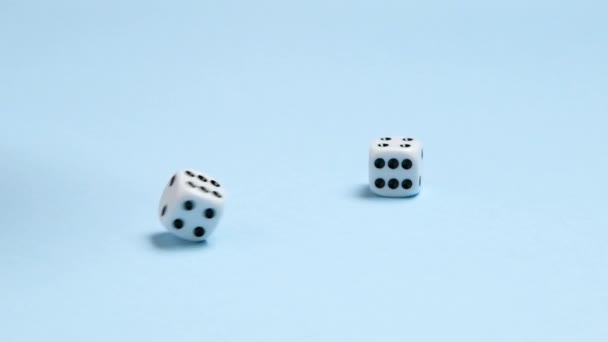 Slow Motion Full View Two Dice Fall Blue Background Rotate — Stock videók