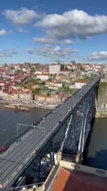 Porto, Portugal - 21.01.2023: Top view on Dom Luis Bridge in Porto town, Portugal. Luis Bridge, is a double-deck metal arch bridge that spans the River Douro between Porto and Vila Nova de Gaia.