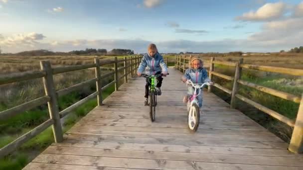Estarreja Portugal 2023 Children Two Girls Sisters Riding Bikes Together — Αρχείο Βίντεο