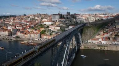 Porto, Portugal - 21.01.2023: Top view on Dom Luis Bridge in Porto town, Portugal. Luis Bridge, is a double-deck metal arch bridge that spans the River Douro between Porto and Vila Nova de Gaia.