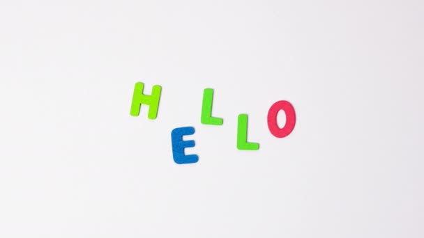 Word Hello Light Gray Background Stop Motion Video Blue Red — Stock Video