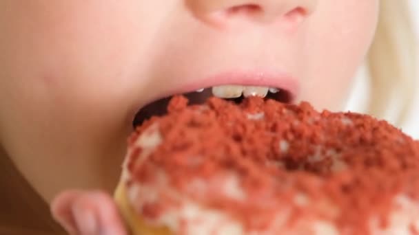 Close View Child Happily Eating Donut Child Eats Doughnut Fast — Stock Video