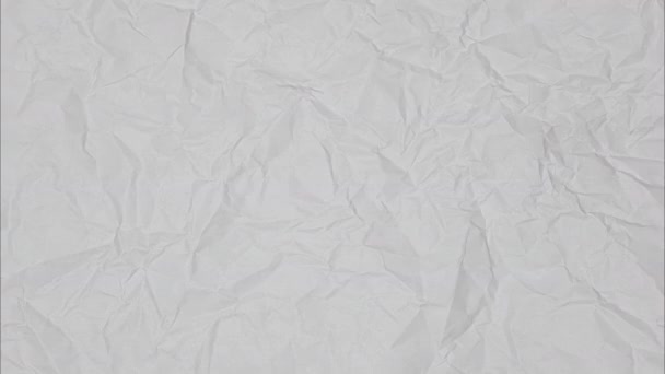 Βίντεο Κάτοψη Ζαρωμένου Λευκού Ανοιχτού Γκρι Χαρτιού Λευκό Τσαλακωμένο Φόντο — Αρχείο Βίντεο