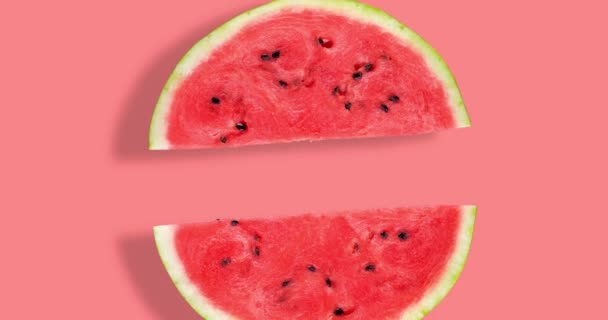 Video Von Flachen Wassermelonenhälften Auf Rosa Hintergrund Wassermelone Sommer Video — Stockvideo