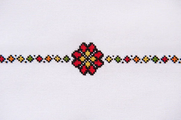 Folk Embroidery Design on White Linen. Background with Fabric Texture and Embroidered Ornament Element.