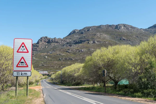 Warning signs at the start of road R301 through Bainskloof Pass between Ceres and Wellington in the Western Cape Province.