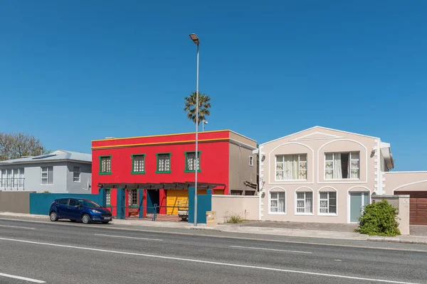 stock image Hermanus, South Africa - Sep 20, 2022: A street scene, with houses and a car, in Hermanus in the Western Cape Province