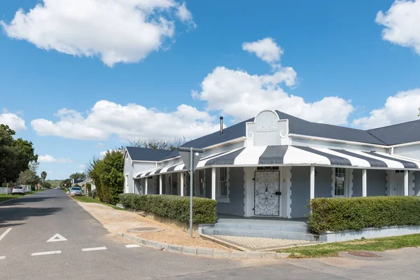 stock image Stanford, South Africa - Sep 20, 2022: A street scene, with an historic house, in Stanford in the Western Cape Province