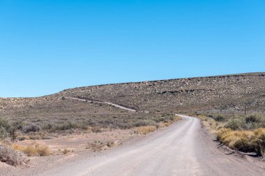 Typical road landscape on the historic Postal Route between Fraserburg and Sutherland in the Northern Cape Karoo