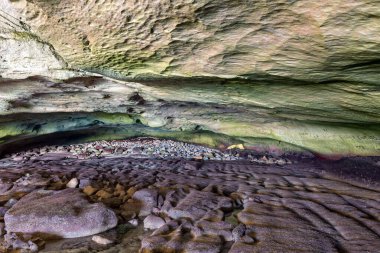 Back entrance of the Waenhuiskrans Cave near Arniston is visble. The cave is accessable only during low tide