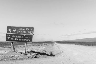 Tankwa, South Africa - Sep 4, 2022: Junction between roads P2250 and R355 in the Tankwa Karoo of the Western Cape Province. Monochrome