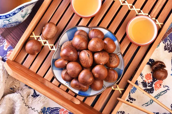 stock image Grilled chestnuts on the plate   