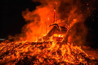 Taichung,Taiwan -December 01, 2024, the kings ship was burned in Zhenlan Palace in Dajia.The burning ceremony of the king's ship was intended to purify the surrounding area of evil and disease.  